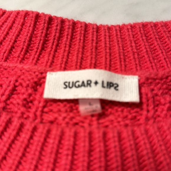 Pink cable knit sweater, slight poof in shoulder. - Picture 3 of 5